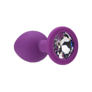 Purple silicone plug with a clear jewel accent on the base
