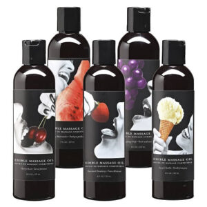 Five bottles of Earthly Body Edible Massage Oil with fruit and dessert themed labels
