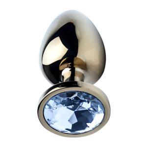 Gold butt plug with a clear faceted gem on the base